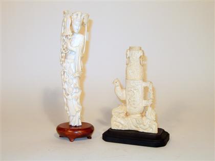 Appraisal: Chinese elephant ivory Quanyin and vase Comprised of a tall