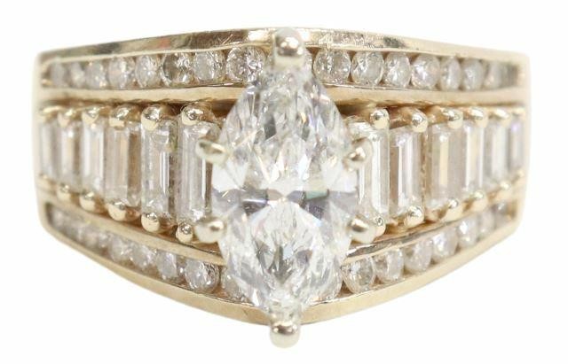 Appraisal: Ladies kt yellow gold and diamond wedding ring comprising marquise-cut