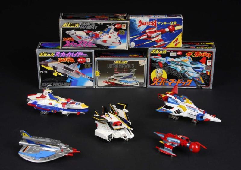 Appraisal: Lot of Die cast vehicles from various Ultraman Description Japanese