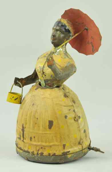 Appraisal: GUNTHERMANN LADY WITH UMBRELLA Germany toy was originally known as