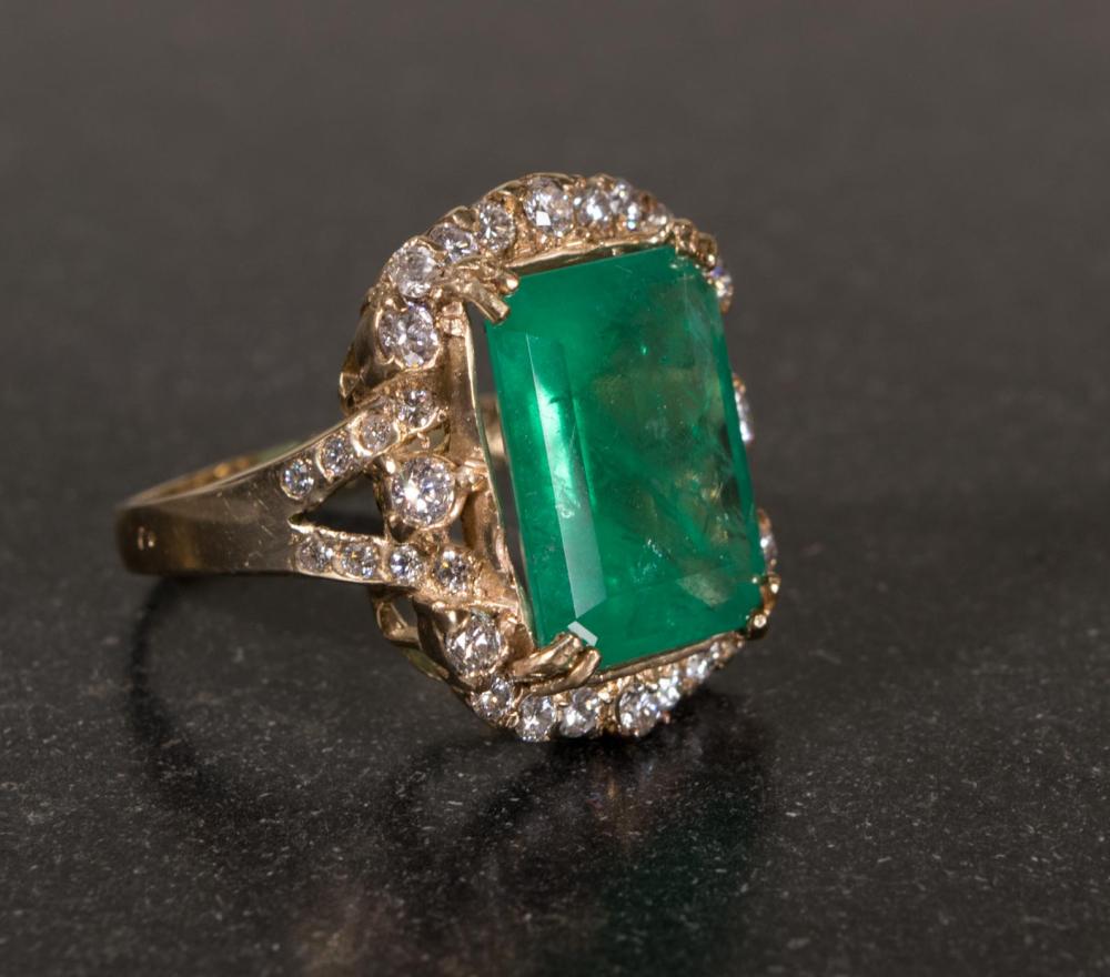 Appraisal: EMERALD DIAMOND AND FOURTEEN KARAT GOLD RING The heavy k