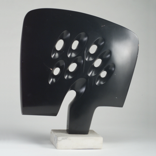 Appraisal: Large pierced abstract sculpture of black enameled wood mounted on