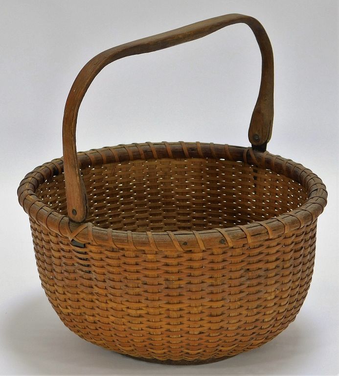 Appraisal: Hand Woven Nantucket Basket with Swing Handle Massachusetts th Century