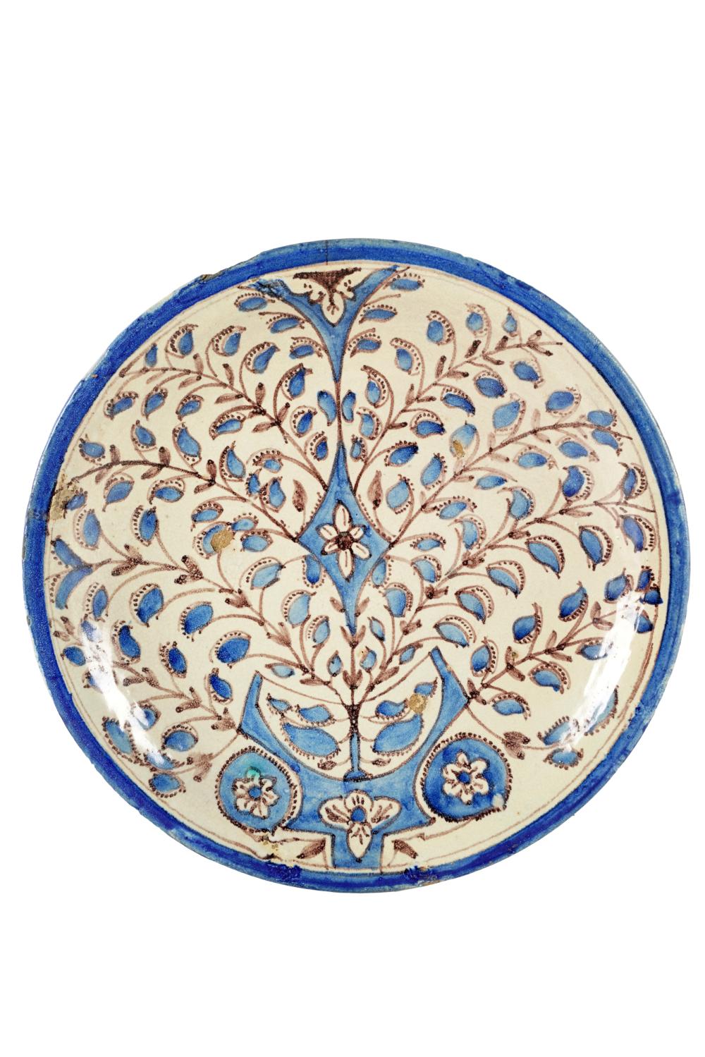 Appraisal: PERSIAN STONEWARE CHARGERCondition chips and loss to surface area and