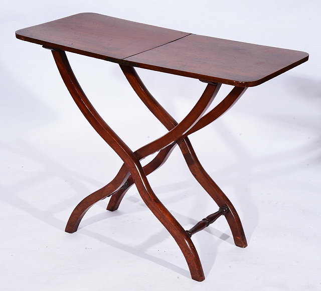 Appraisal: A VICTORIAN MAHOGANY FOLDING CAMPAIGN TABLE with rectangular top and