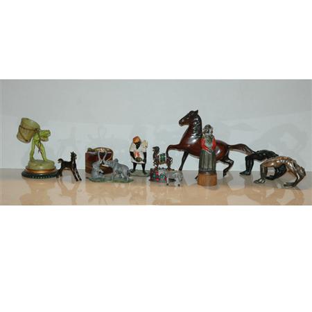 Appraisal: Group of Metal and Painted Metal Figures and Toys Estimate