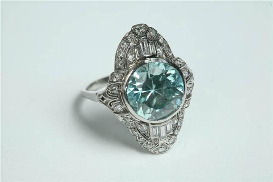 Appraisal: ZIRCON AND DIAMOND RING Platinum Art Deco ring Center round