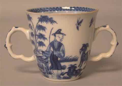 Appraisal: TWO-HANDLED BLUE AND WHITE CHOCOLATE CUP probably English early Worcester