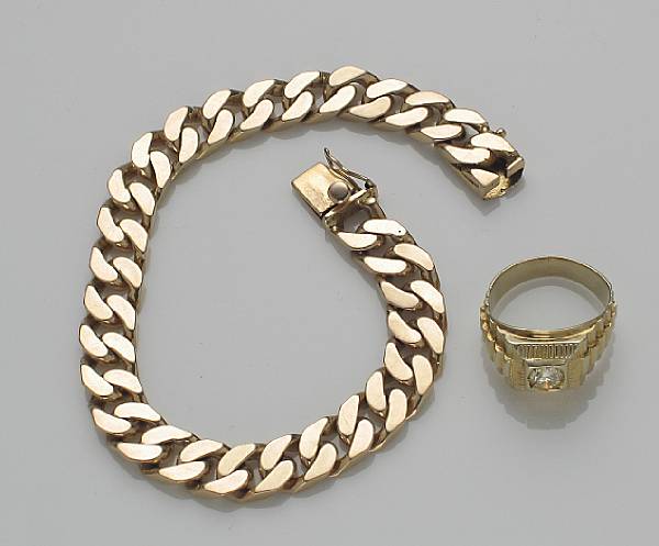 Appraisal: A k gold curb link bracelet together with a diamond