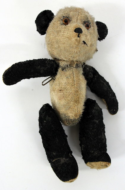 Appraisal: A SMALL EARLY TH CENTURY PANDA PLUSH TEDDY BEAR with