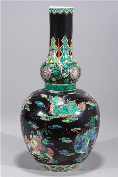 Appraisal: Chinese famille verte enameled porcelain black ground vase with dragons