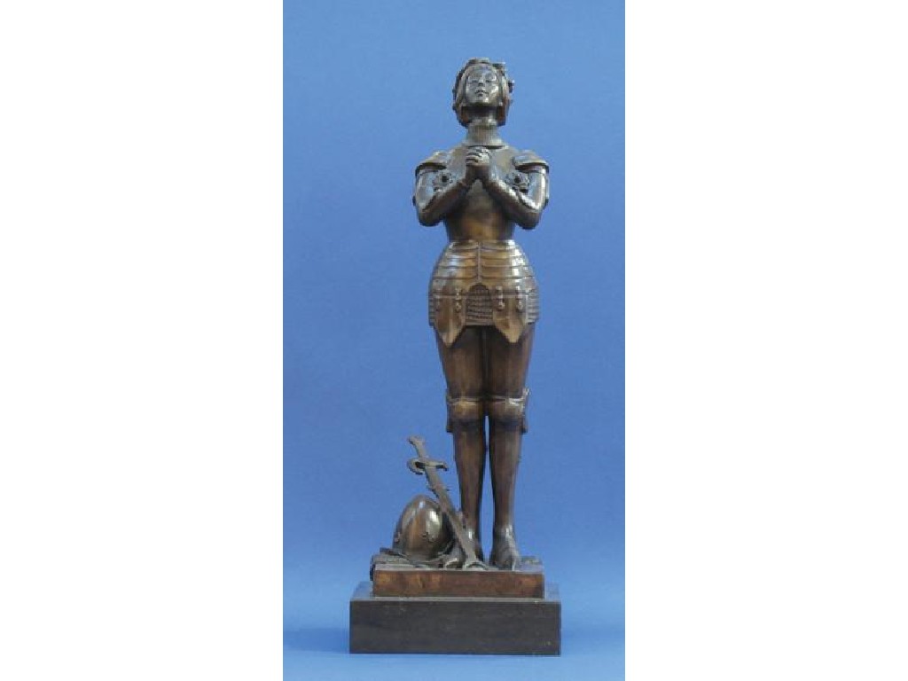 Appraisal: A CAST BRONZE STATUE OF JOAN OF ARC standing with