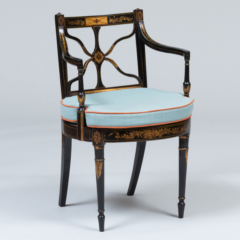 Appraisal: Regency Ebonized Parcel-Gilt and Caned Armchair x x in height