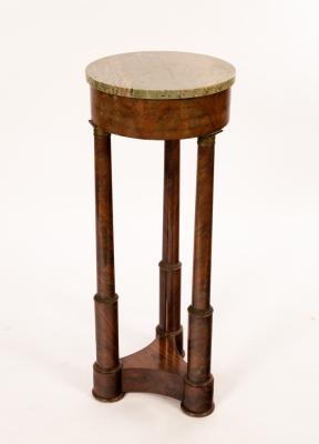 Appraisal: A French Empire walnut gueridon with circular green onyx top