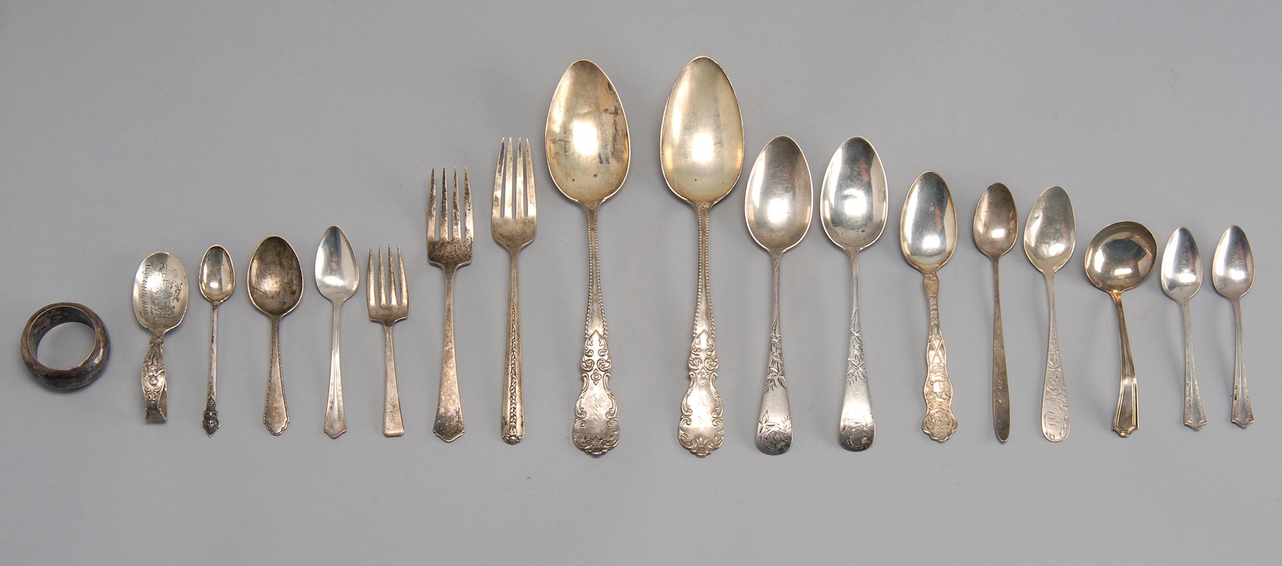 Appraisal: EIGHTEEN PIECES OF STERLING SILVER AND SILVER PLATED FLATWARE by