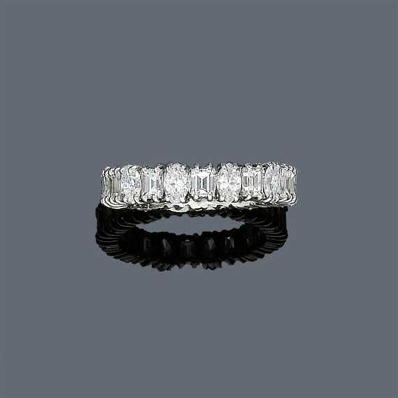 Appraisal: DIAMOND RING ca Platinum Elegant wedding band model set with