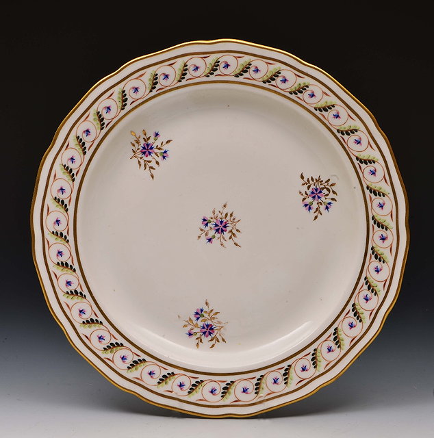 Appraisal: Derby platecirca decorated in polychrome and gilding with a scroll