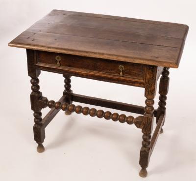 Appraisal: A William and Mary oak side table the planked top