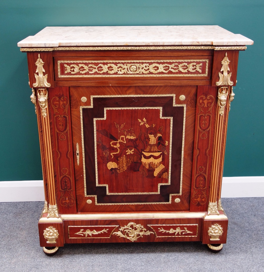 Appraisal: A Louis XVI style gilt metal mounted marquetry inlaid kingwood