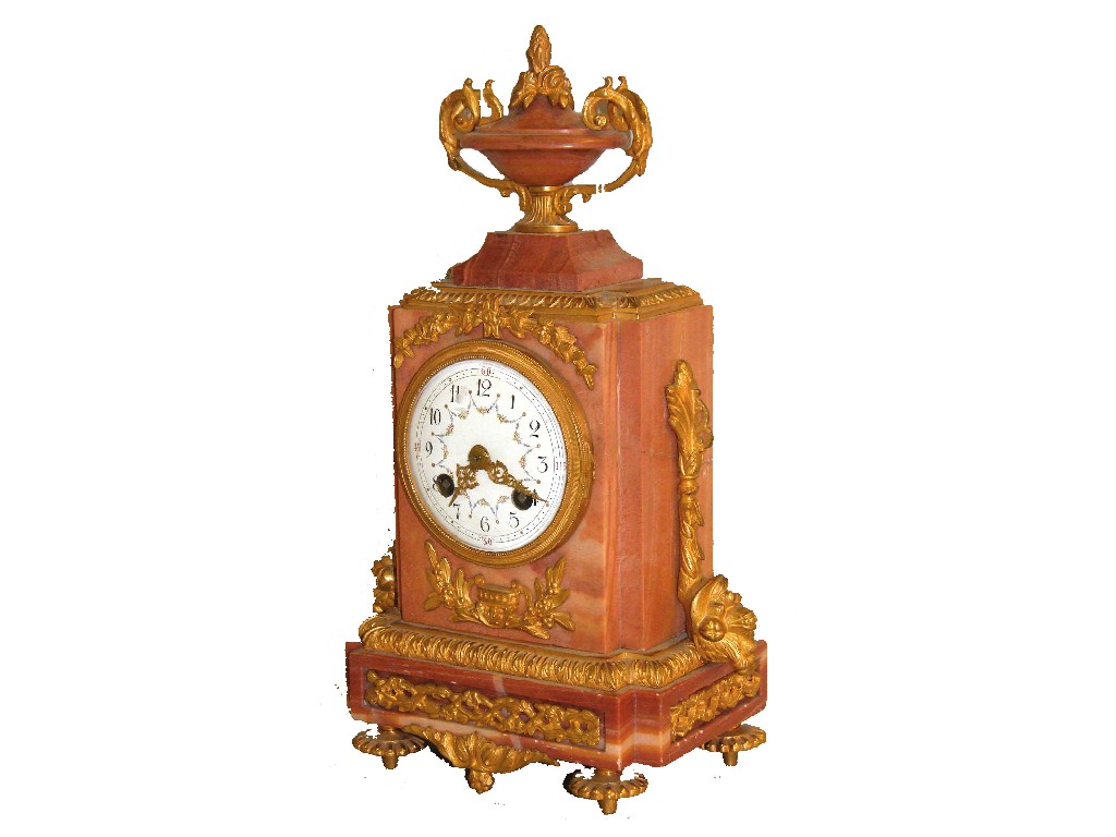 Appraisal: French pink marble and ormolu mounted two train mantel clock