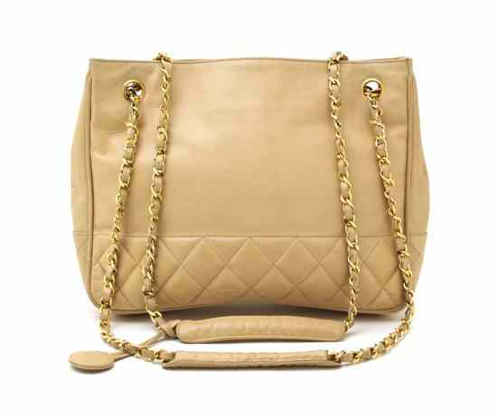 Appraisal: A Chanel Tan Leather Bag partially quilted around the bottom