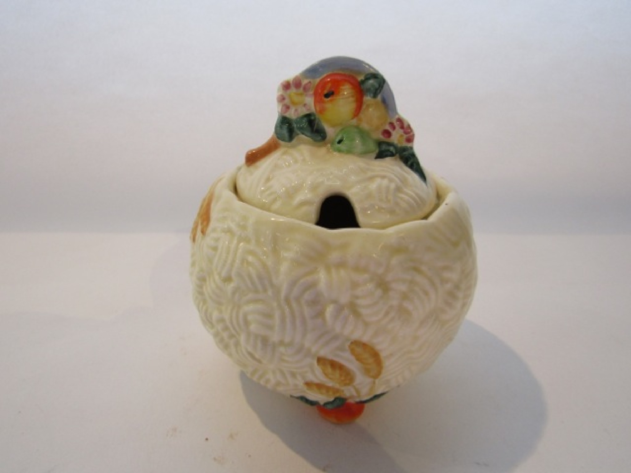 Appraisal: A Newport Pottery Clarice Cliff preserve pot and cover in