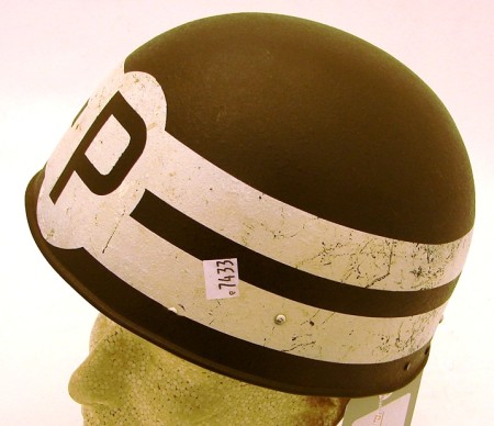 Appraisal: British paratrooper-style steel helmet Exterior of shell is spray painted