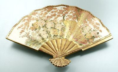 Appraisal: Satsuma earthenware fan dish peacock with flowering plum and peonies