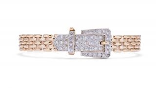 Appraisal: A GOLD BELT AND DIAMOND BUCKLE BRACELET Woven texture in