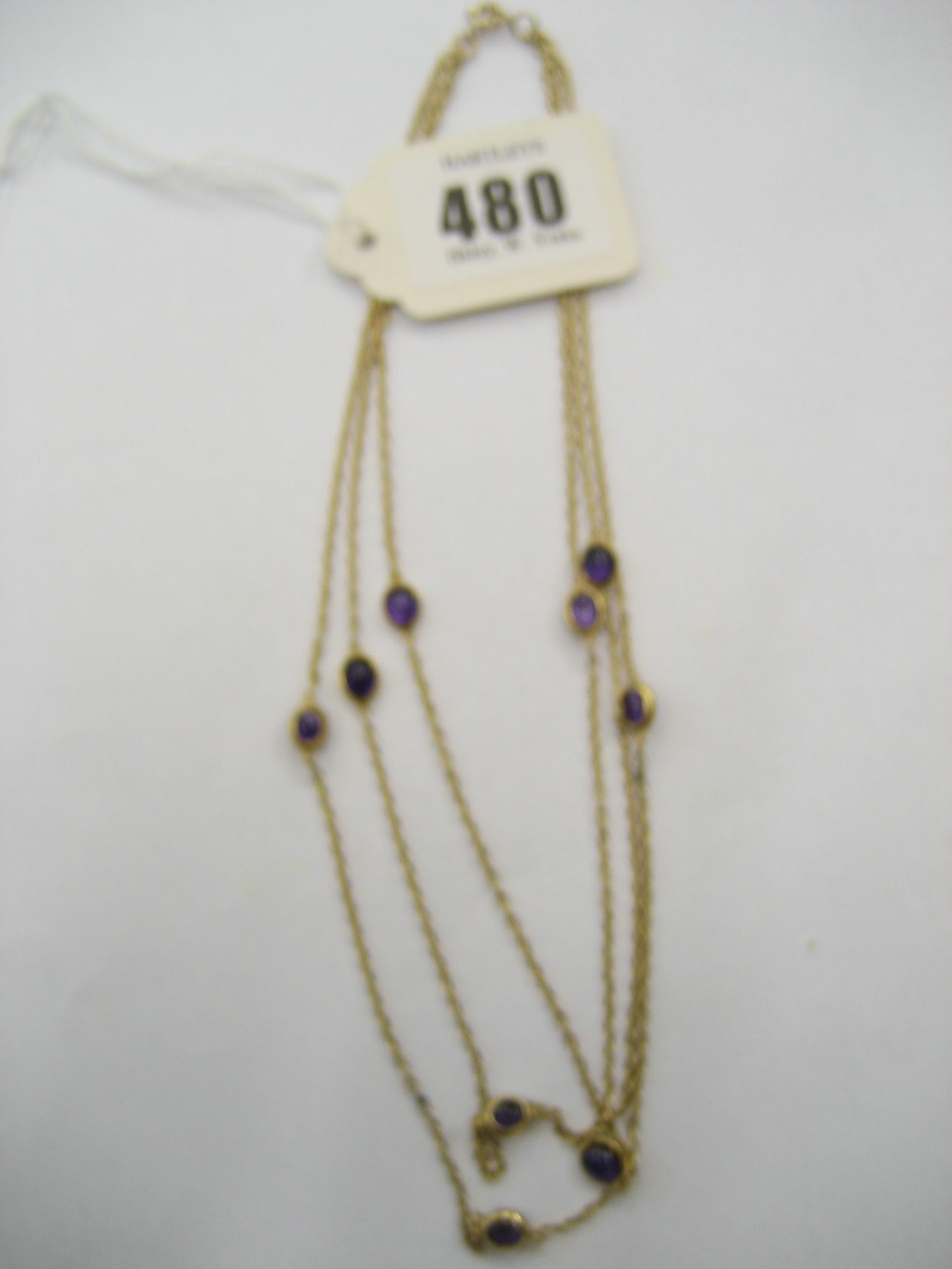 Appraisal: AN AMETHYST NECKLACE comprising three ct gold chains each mounted