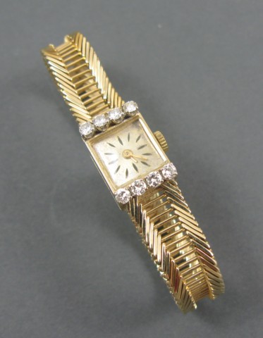 Appraisal: LADY'S DIAMOND AND GOLD BRACELET WRISTWATCH K yellow gold case