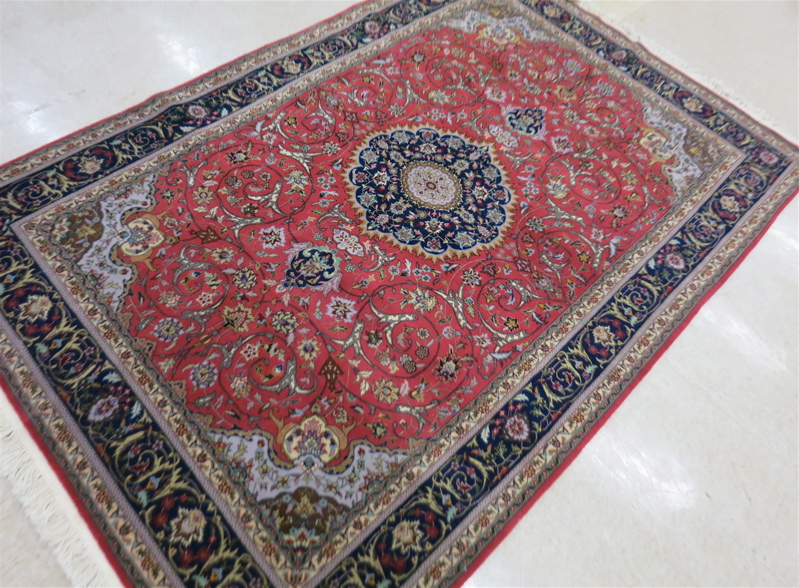 Appraisal: HAND KNOTTED ORIENTAL CARPET Indo-Persian central medallion and scrolling floral