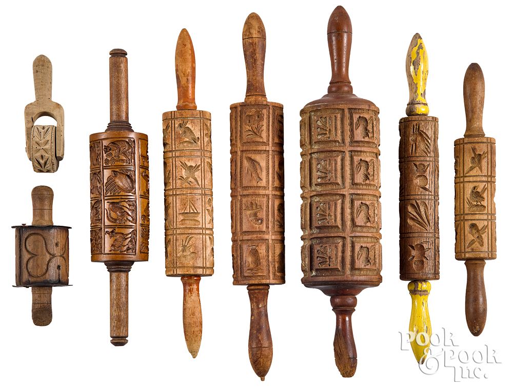 Appraisal: Collection of rolling pin springerle molds longes Collection of rolling