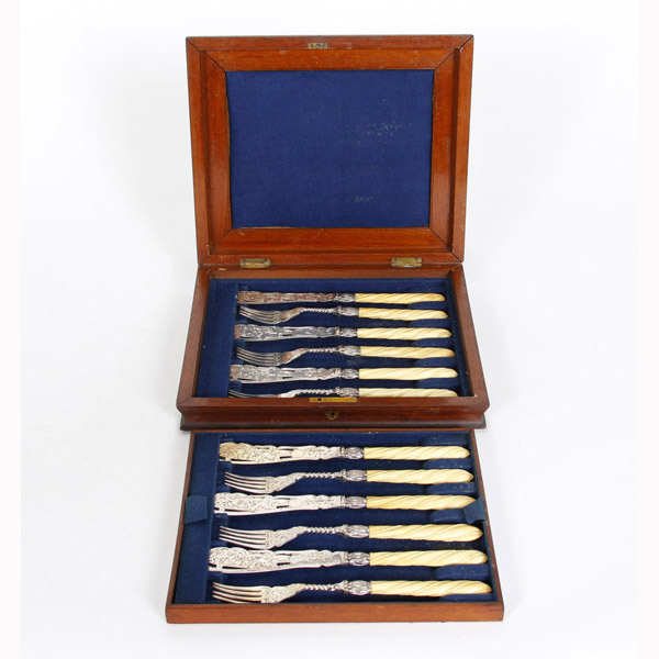 Appraisal: Victorian sterling silver carved ivory handled cased fish cutlery service