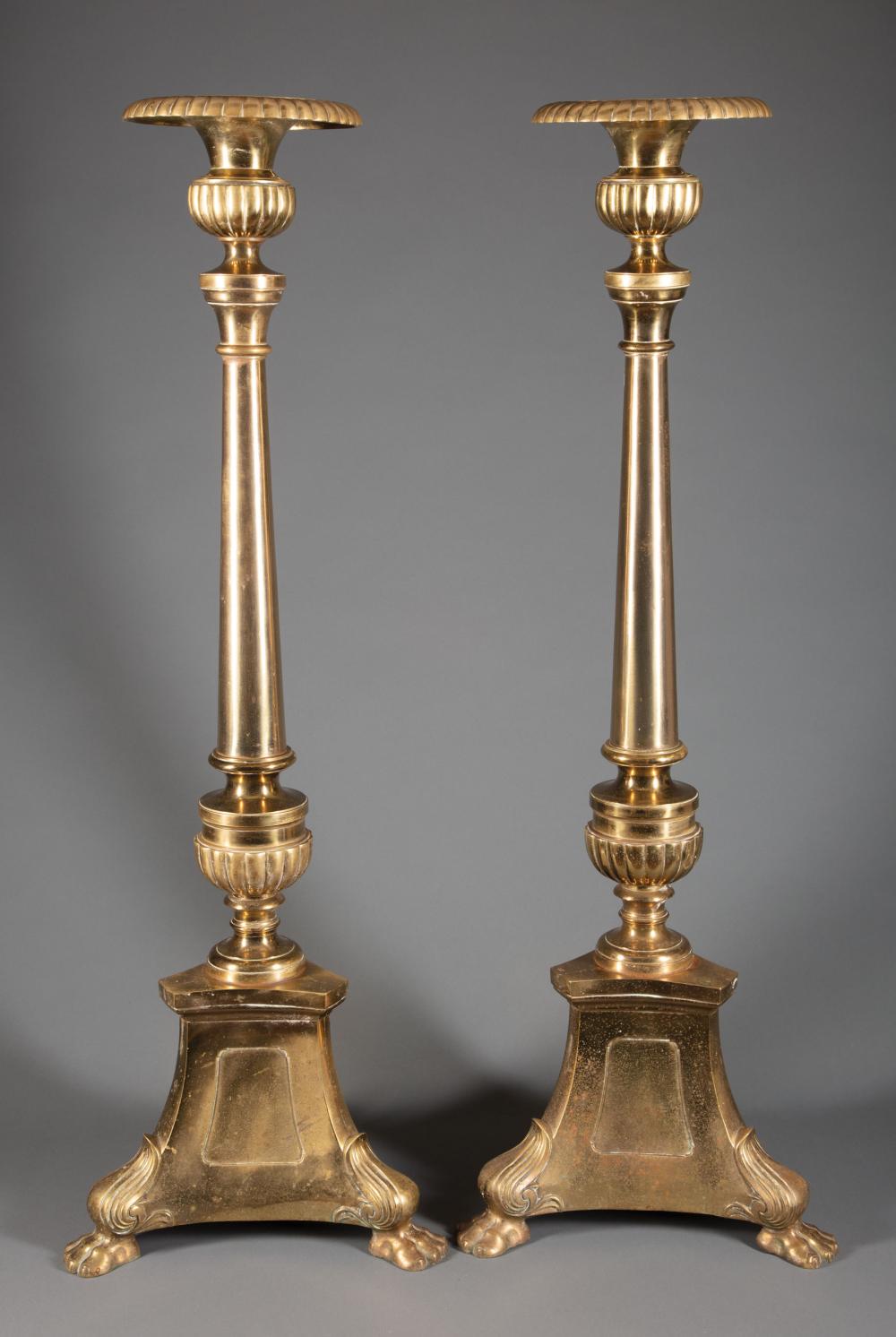 Appraisal: Pair of Large Brass Altar Candlesticks th c tripartite base