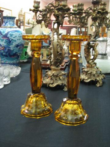 Appraisal: Pair of amber Bohemian glass candlesticks with stag motif ''