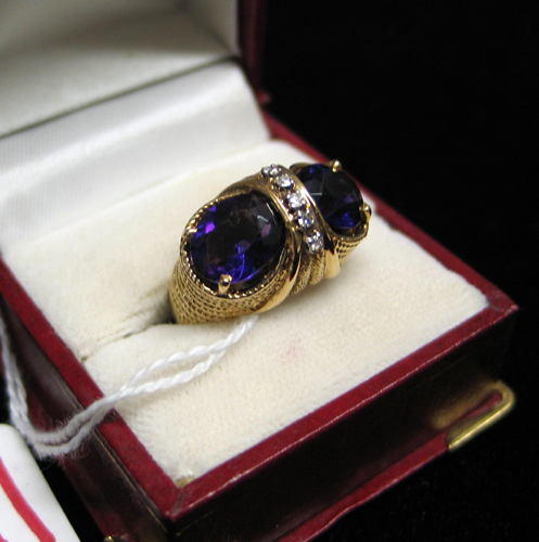 Appraisal: AMETHYST DIAMOND AND TEN KARAT GOLD RING set with a