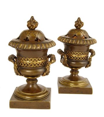 Appraisal: A pair of late th century parcel gilt bronze perfume