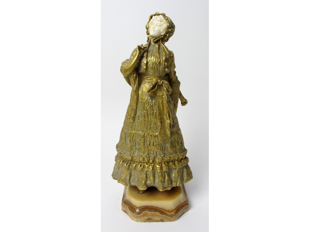 Appraisal: Margriet A bronze and ivory figure of a Victorian lady