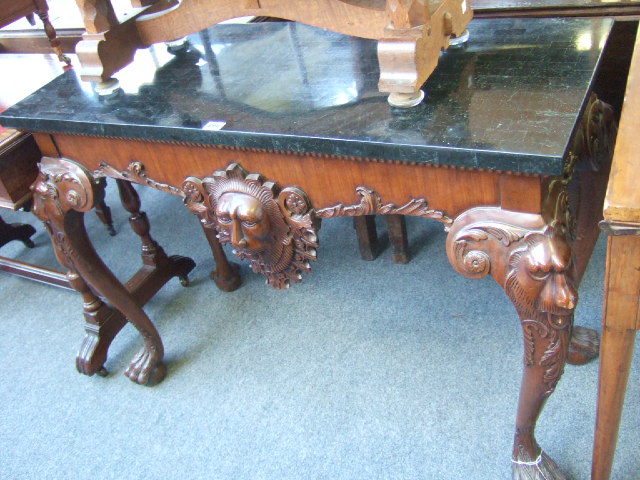 Appraisal: A mid th century style console table the faux black