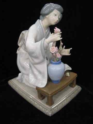 Appraisal: Lladro Porcelain Figurine ''Oriental Girl with flowers'' '' excellent