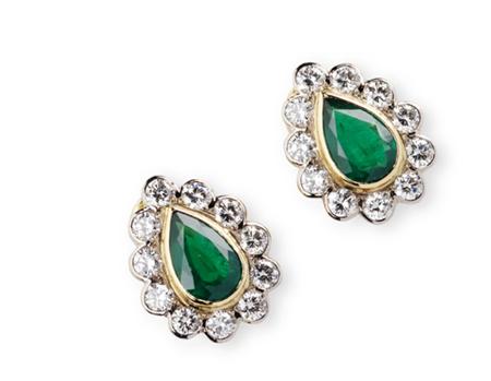 Appraisal: A pair of emerald and diamond set earrings each designed