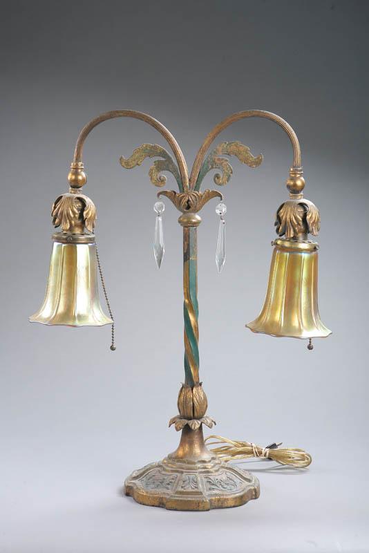 Appraisal: DOUBLE SHADE TABLE LAMP Two gold Aurene ribbed lamp shades