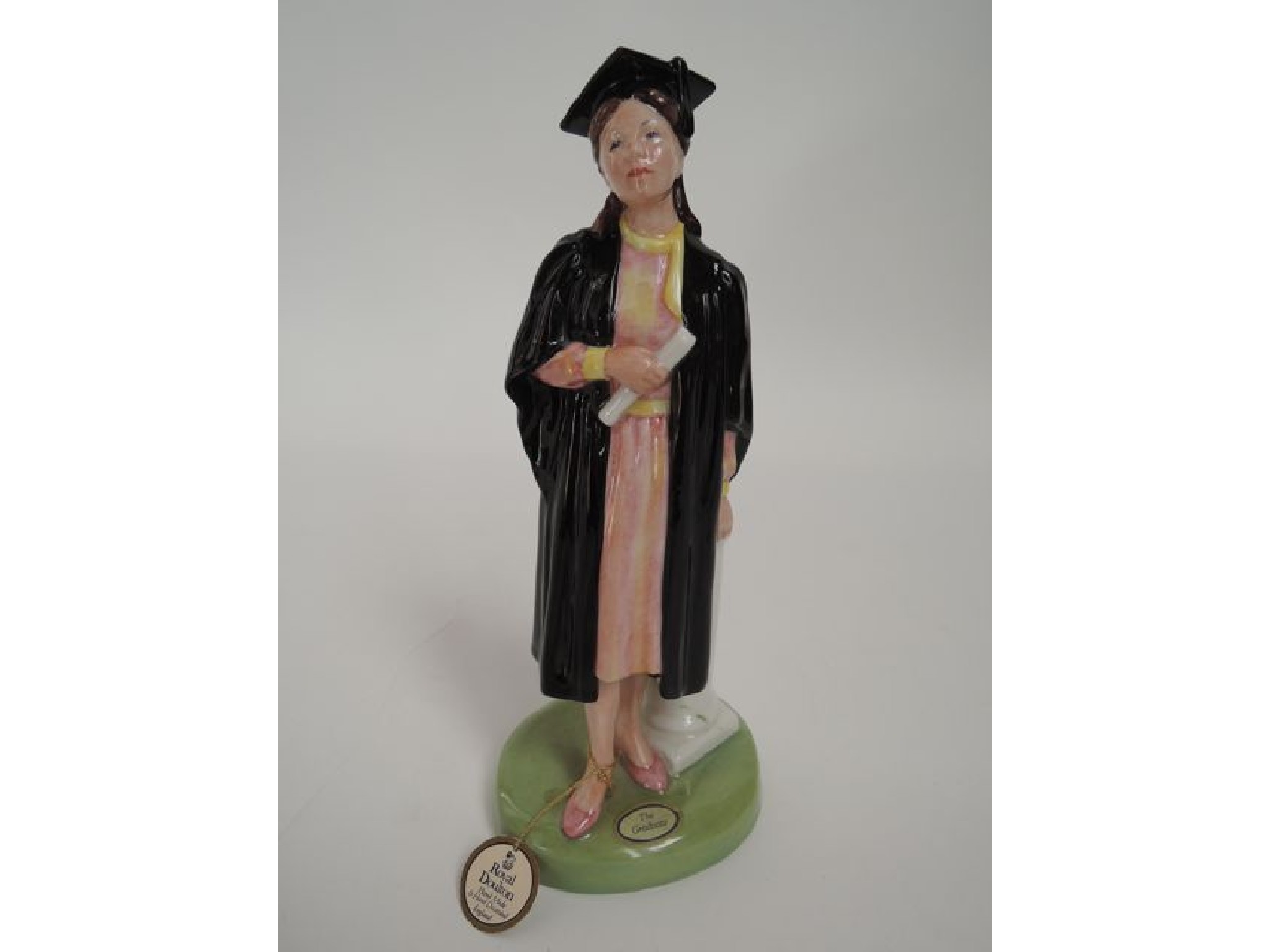 Appraisal: A Royal Doulton figure The Graduate modelled by P Parsons