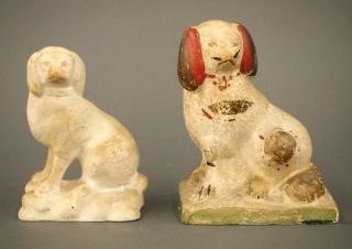 Appraisal: Chalkware dogs Two late th century chalkware dogs one with