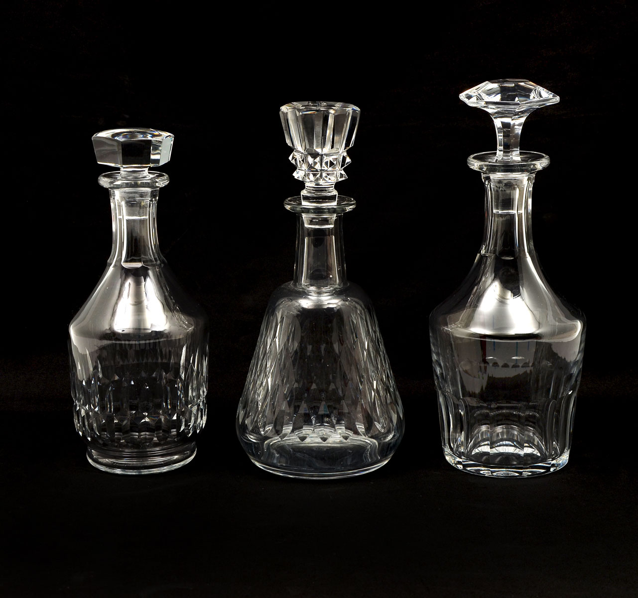 Appraisal: BACCARAT CRYSTAL DECANTERS Waterford crystal decanters of different patterns having