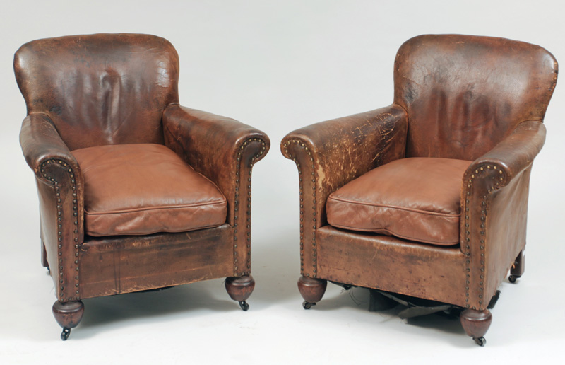 Appraisal: Pair of Edwardian Leather Club Chairs With later bun feet