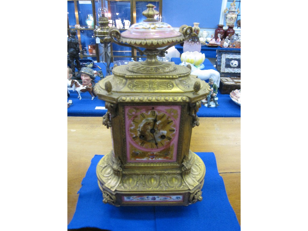 Appraisal: French gilt metal and porcelain mantle clock