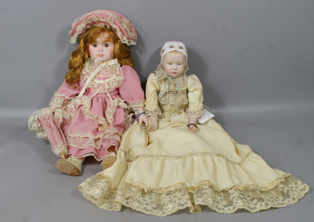 Appraisal: German Reproduction Character dolls the girl in pink is a