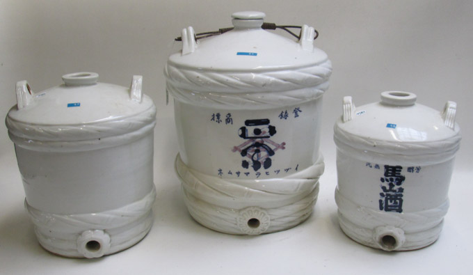 Appraisal: THREE JAPANESE POTTERY SAKI JUGS each with white glaze two